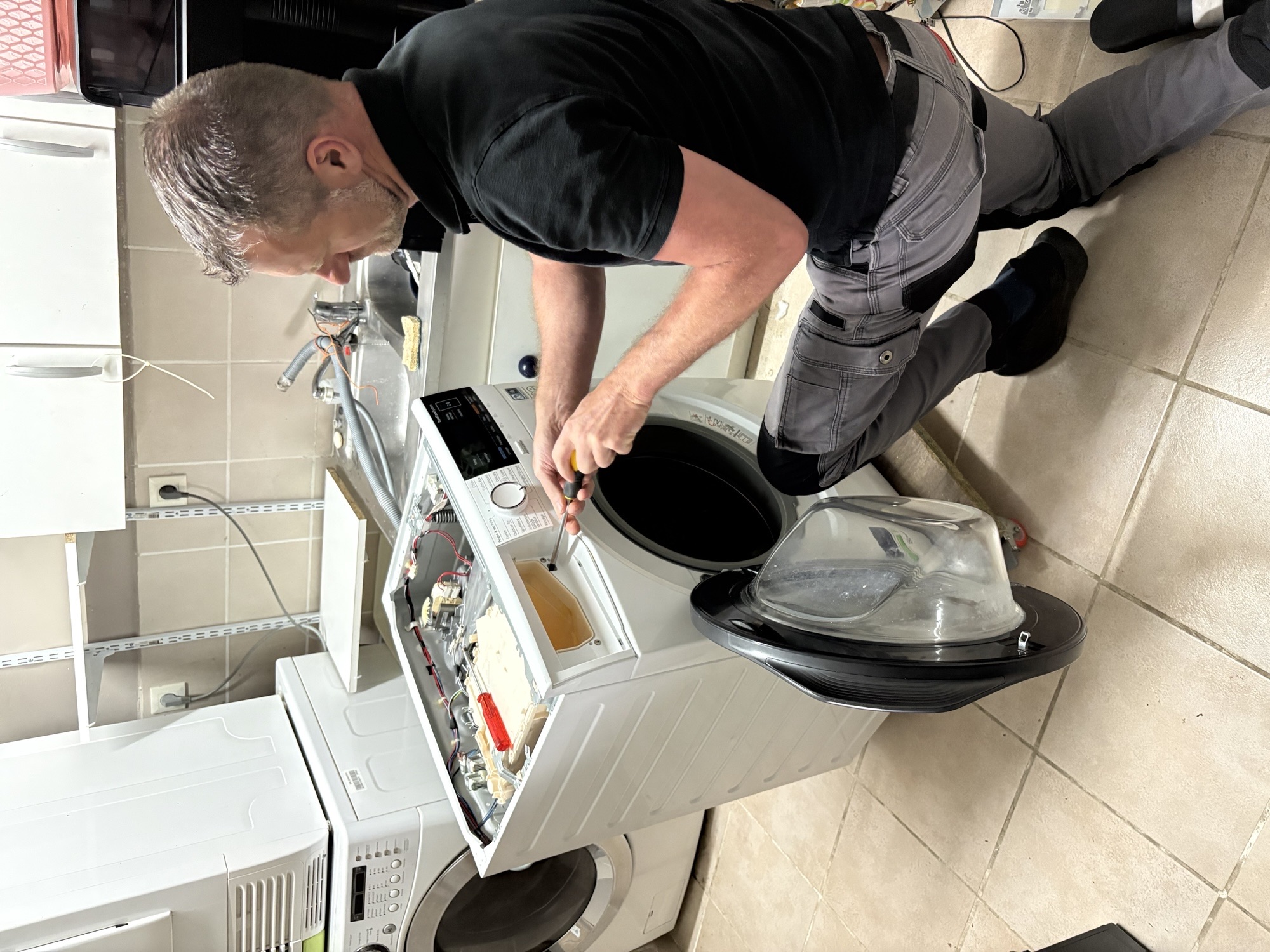 Intervention sur un lave-linge avec accès au tambour